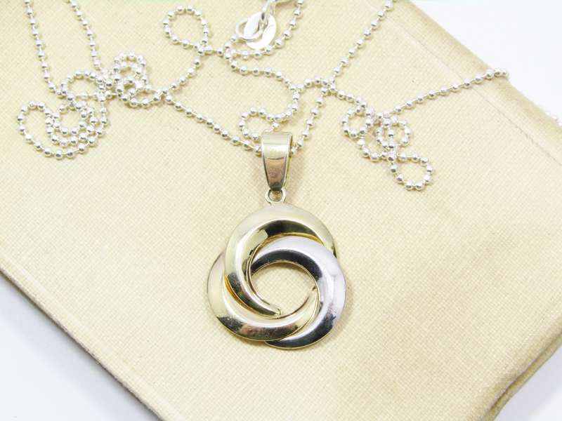 A Stunning Gold Gilt Over Sterling Silver Pendant on Chain