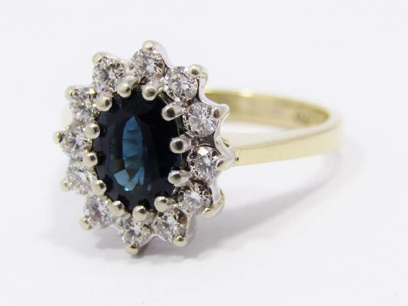 Captivating 18CT Gold, Sapphire & Diamond Halo Ring