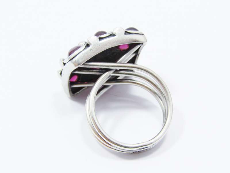 A Gorgeous Chunky Ring set With Cabochon Garnets in Sterling Silver.