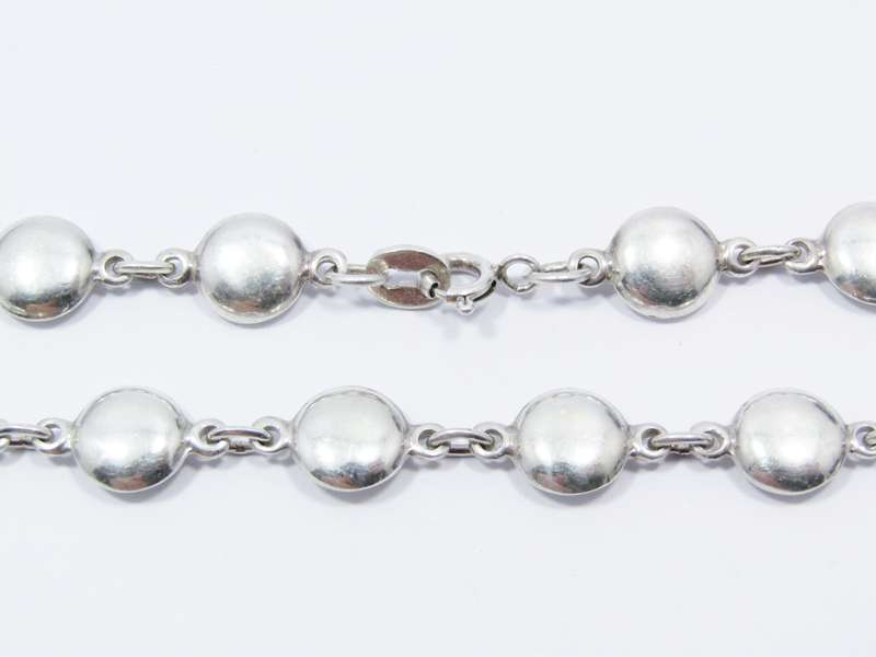 A Beautiful Smartie Design Necklace in Sterling Silver.