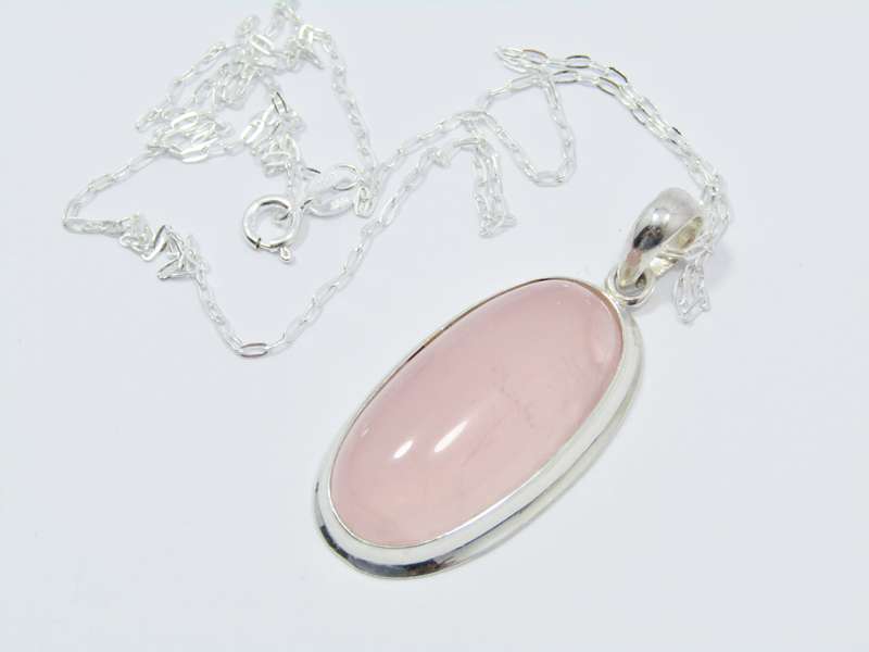 A Lovely Large Rose Quartz Pendant on Chain in Sterling Silver.
