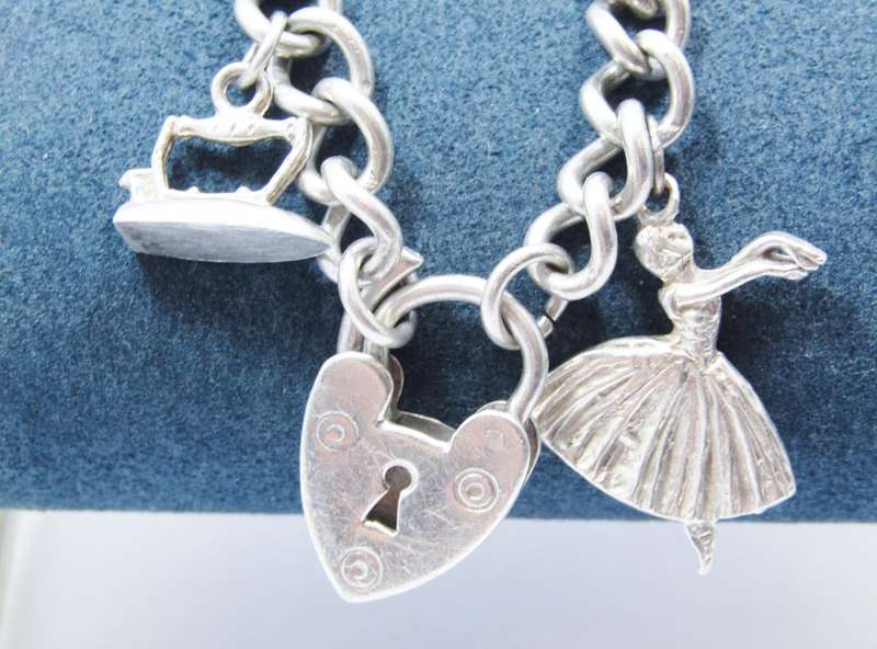 A Stunning Vintage Charm Bracelet With a Padlock Clasp in Sterling Silver