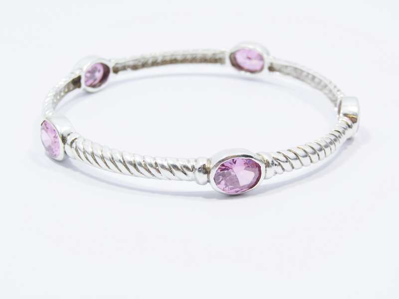 A Gorgeous Weight Pink Stone Bangle in Sterling Silver.