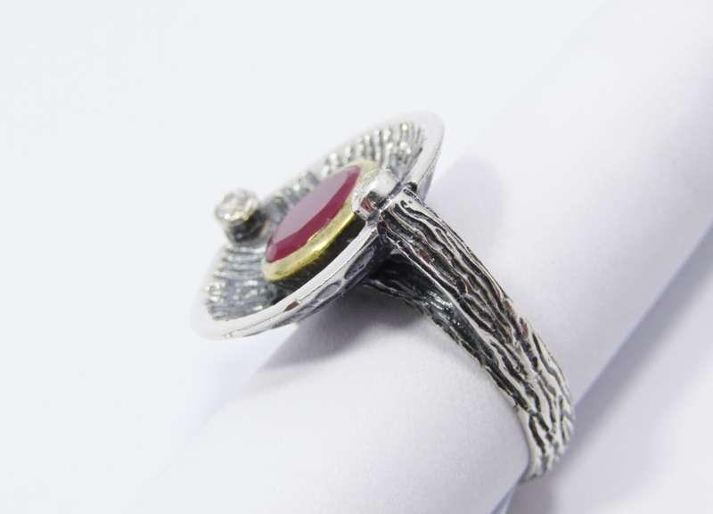 A Stunning Two Tone Brass over Sterling Silver ring with a Synthetic Ruby in Sterling Silver.