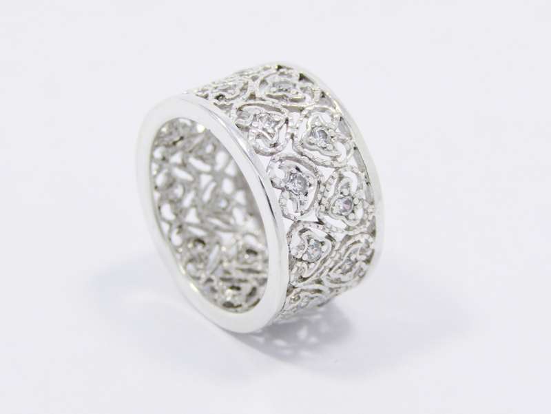 A Very Pretty Broad Filigree Band dotted with tiny Zirconias in Sterling Silver.
