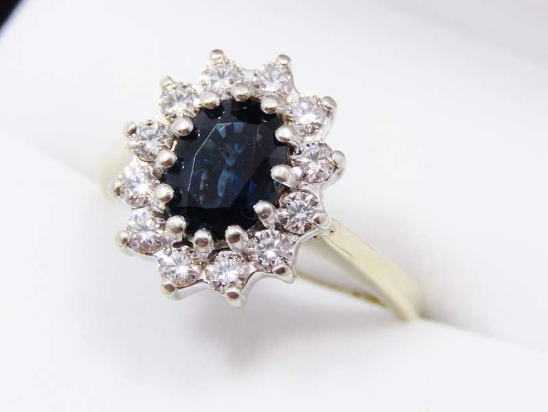 Captivating 18CT Gold, Sapphire & Diamond Halo Ring