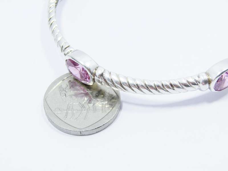A Gorgeous Weight Pink Stone Bangle in Sterling Silver.