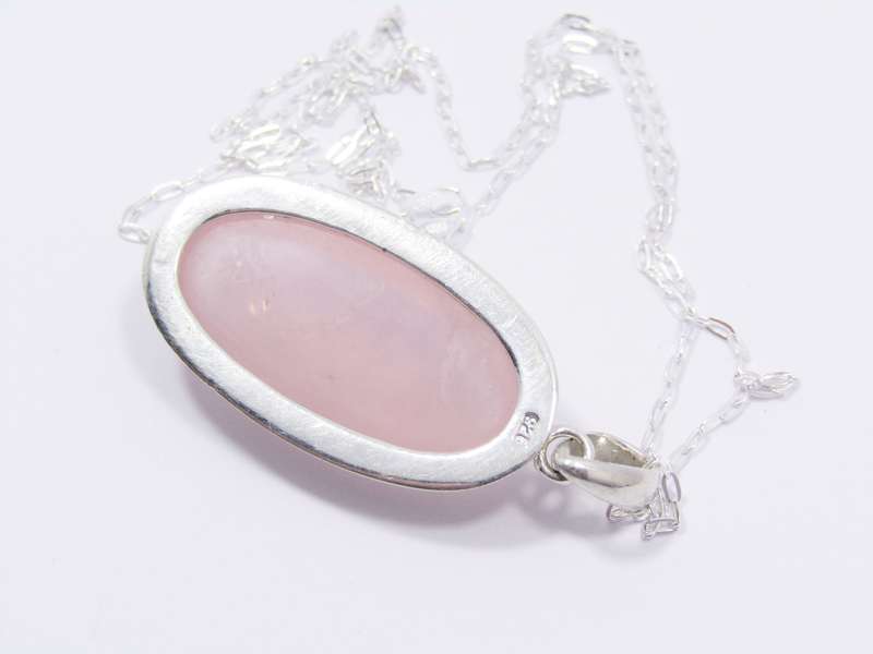 A Lovely Large Rose Quartz Pendant on Chain in Sterling Silver.