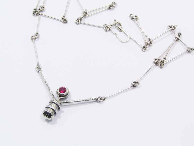 A Stunning Weighty Red Paste Stone Necklace in Sterling Silver