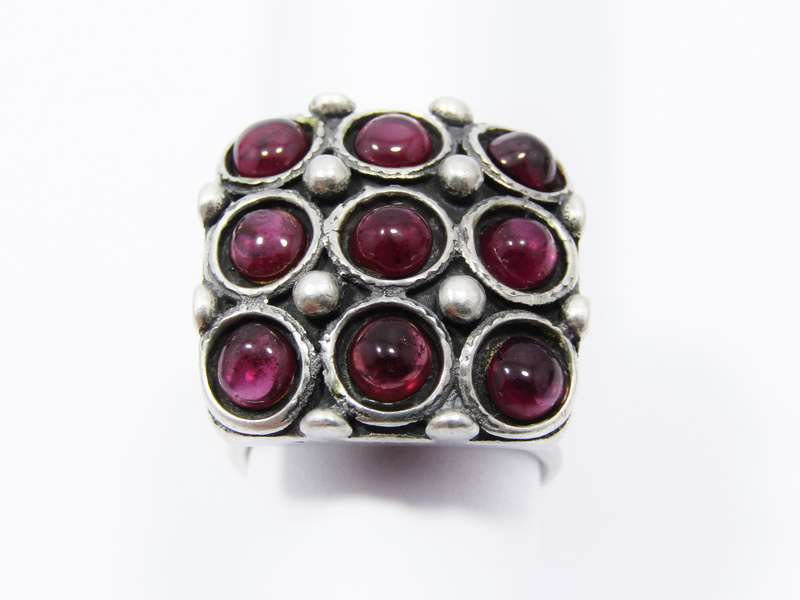 A Gorgeous Chunky Ring set With Cabochon Garnets in Sterling Silver.