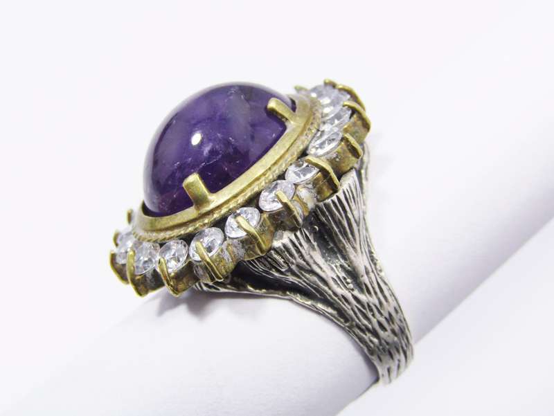 A Stunning Chunky Two Tone Cabochon Amethyst Surrounded With Clear Crystals in Sterling Silver