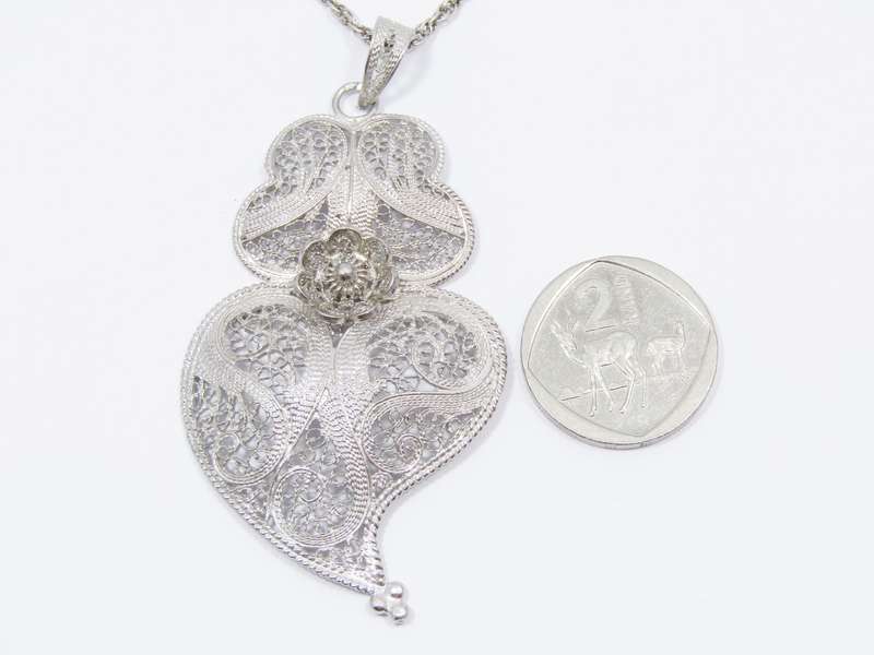 A Stunning Large Filigree Pendant on Chain in Sterling Silver.