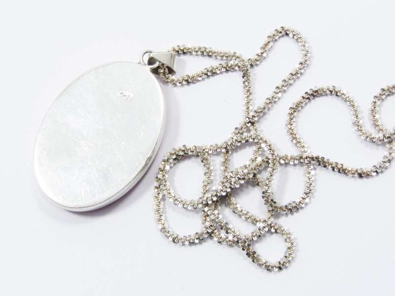 A Stunning Coral Pendant on Chain in Sterling Silve