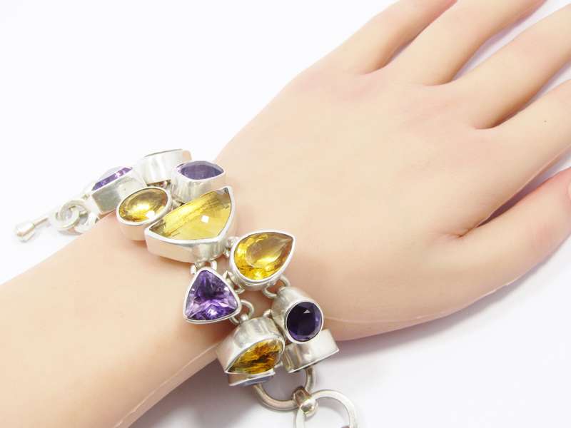 A Stunning Huge Gemstone Bracelet Bracelet Set with Amethysts and Citrines in Sterling Silver.