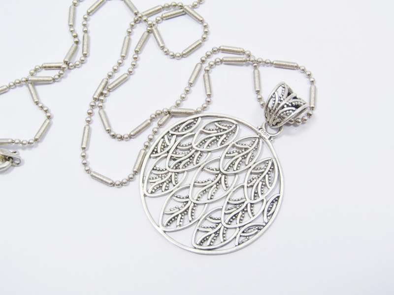 A Beautiful Large Round Leaf Design Pendant on Chain in Sterling Silver.