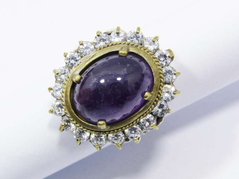 A Stunning Chunky Two Tone Cabochon Amethyst Surrounded With Clear Crystals in Sterling Silver