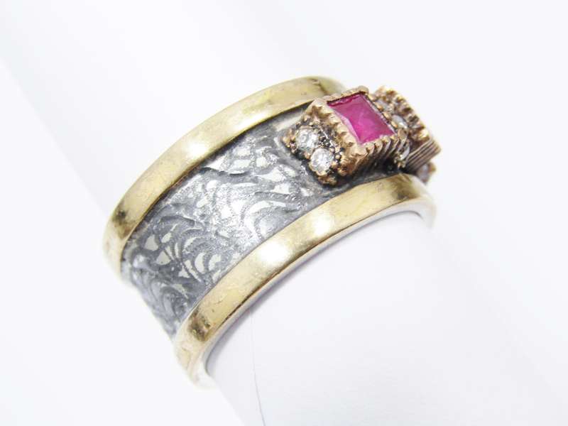 A Beautiful Weighty Three Stone Ring in a Copper over Sterling Silver.