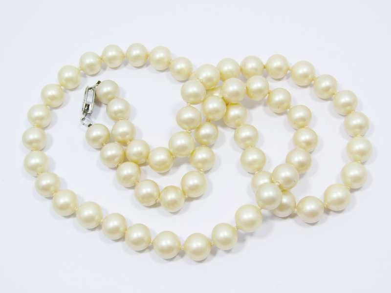 A Lovely String of  Vintage Faux Pearls with a Sterling Silver Clasp