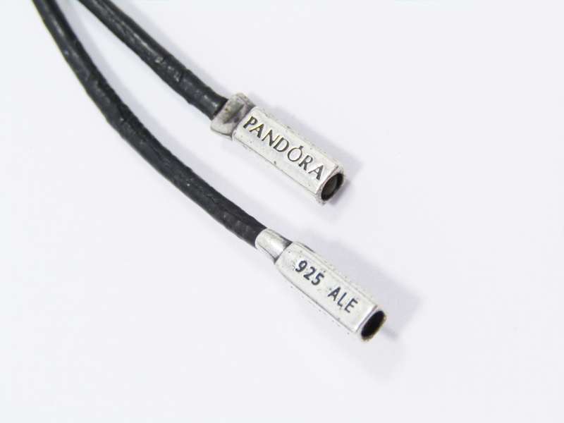 An Early Pandora Sterling Silver & Leather Fob