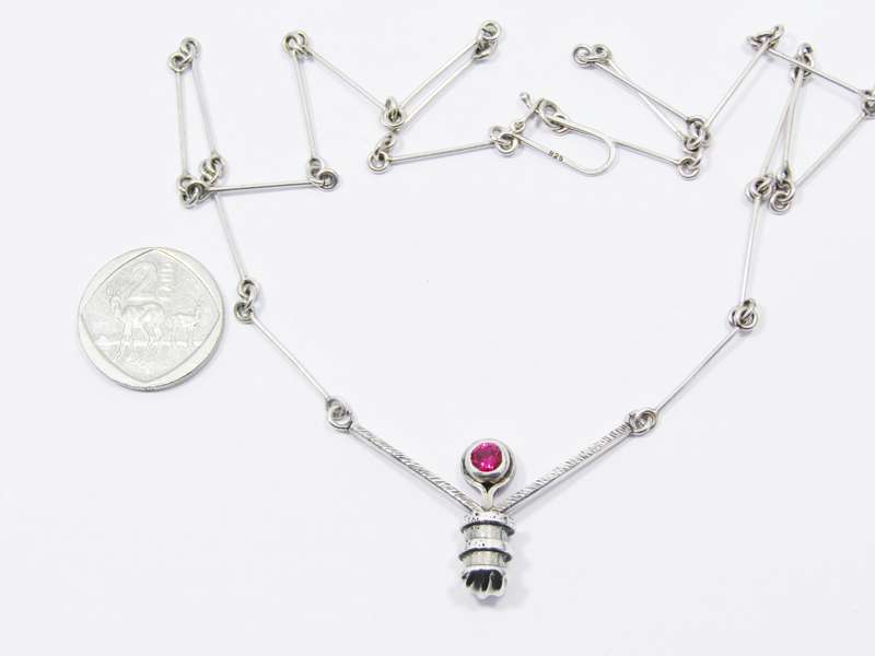 A Stunning Weighty Red Paste Stone Necklace in Sterling Silver