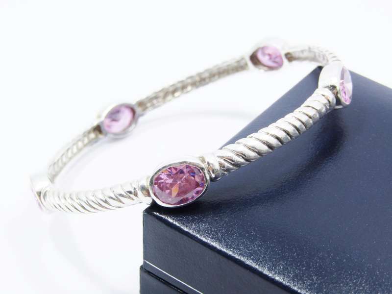 A Gorgeous Weight Pink Stone Bangle in Sterling Silver.