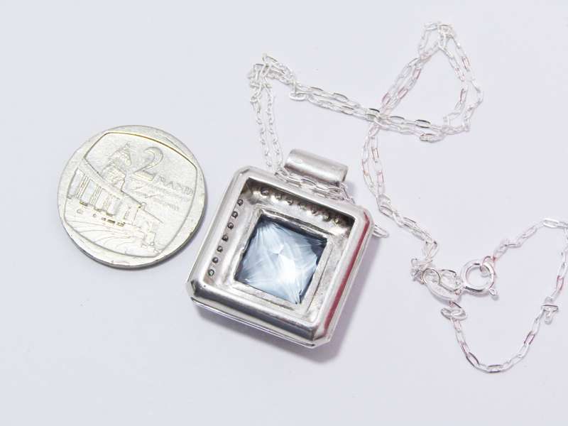 A Gorgeous Square Blue And Clear Zirconia Pendant on Chain in Sterling Silver.