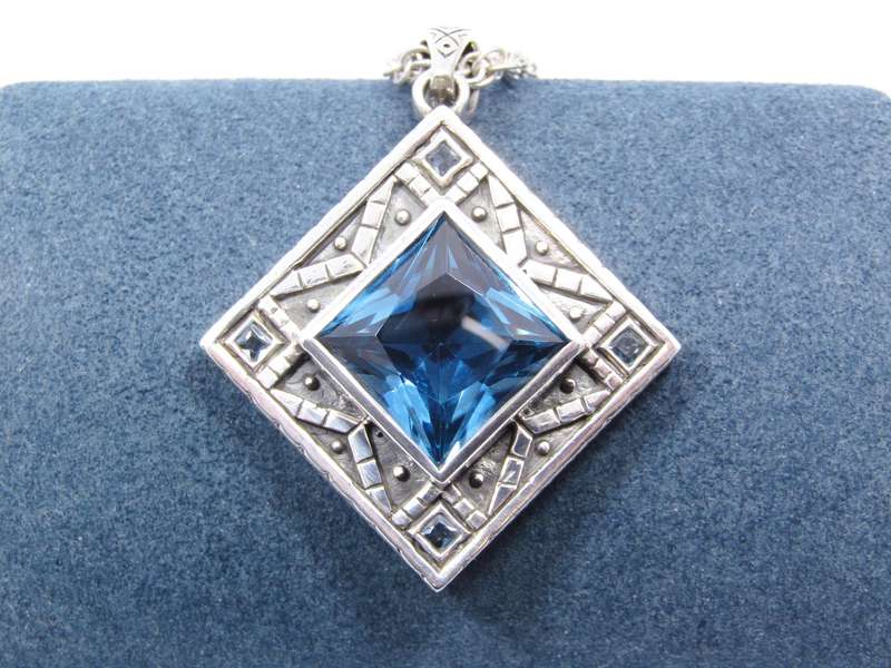 A Stunning Huge Vivid Blue Zirconia Pendant on Chain in Sterling Silver.