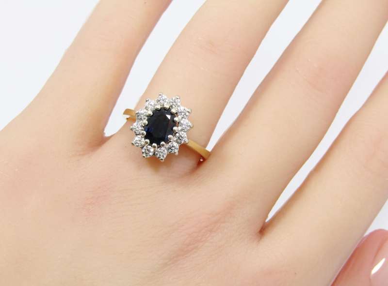 Captivating 18CT Gold, Sapphire & Diamond Halo Ring