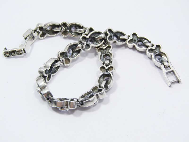 A Gorgeous Vintage Design Zirconia Tennis Bracelet With Marcasite's in Sterling Silver.