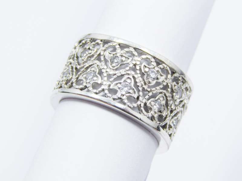 A Very Pretty Broad Filigree Band dotted with tiny Zirconias in Sterling Silver.