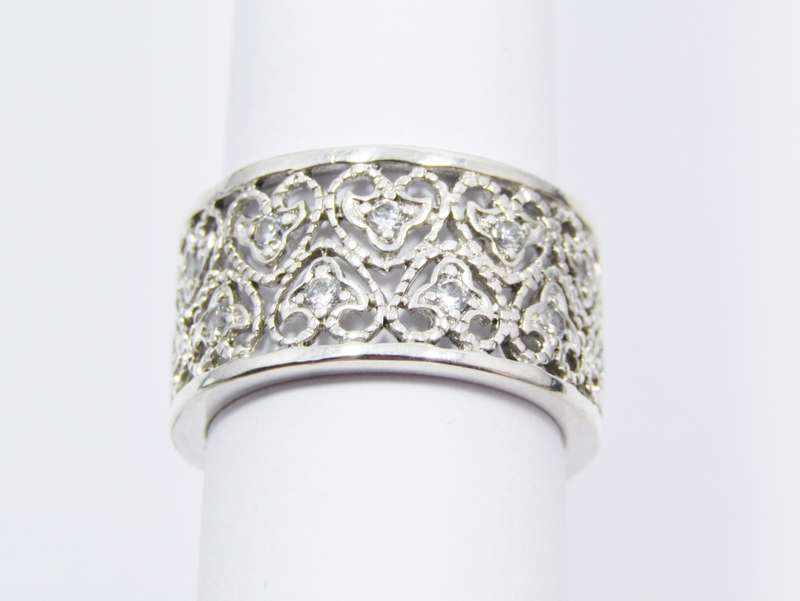 A Very Pretty Broad Filigree Band dotted with tiny Zirconias in Sterling Silver.
