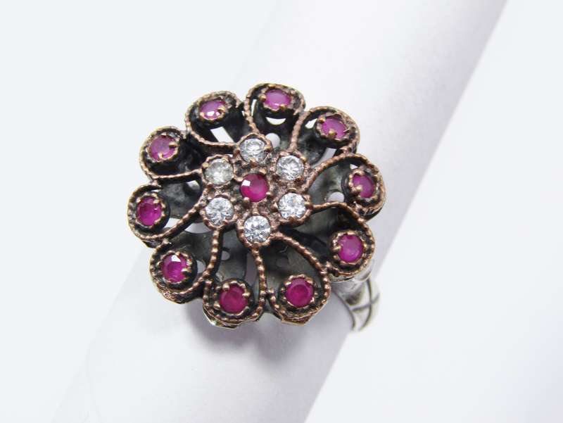 A Lovely Two Tone Eastern Design Ring With Pink and Clear Paste Stones in Sterling Silver.