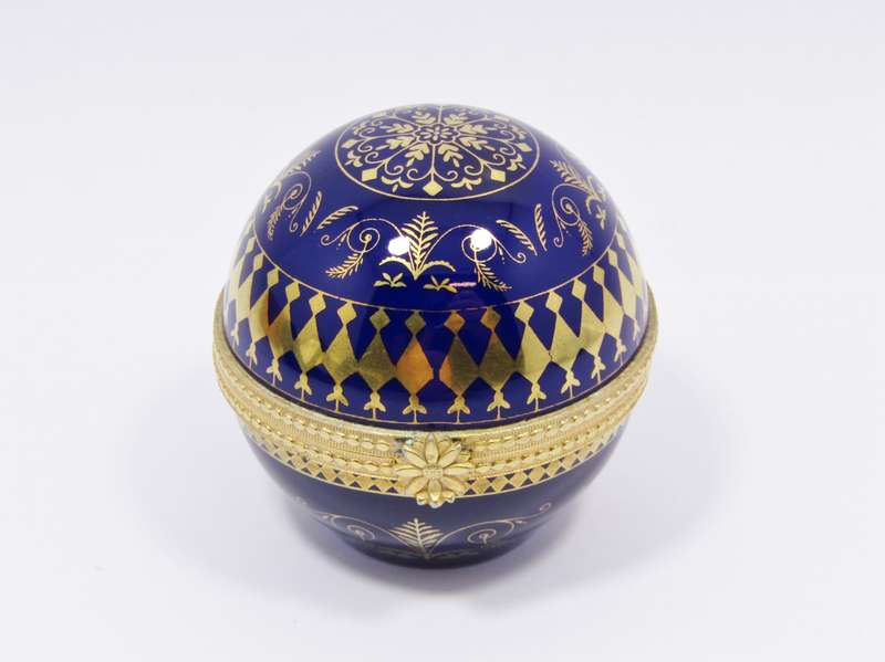 A Beautiful Cobalt Blue and Gold Estee Lauder Porcelain round Keepsake Box