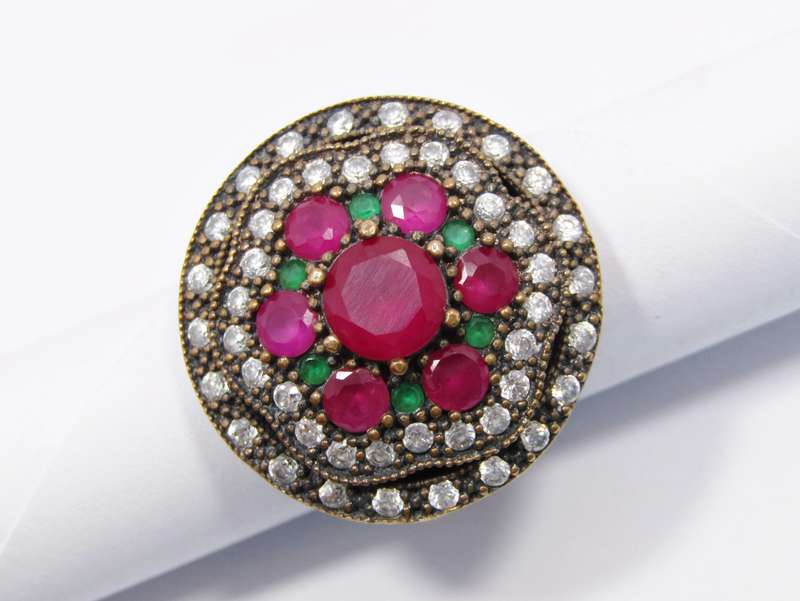 A Gorgeous Huge Eastern Design Ring Set With Pink, Green and White Crystals in Sterling Silver.