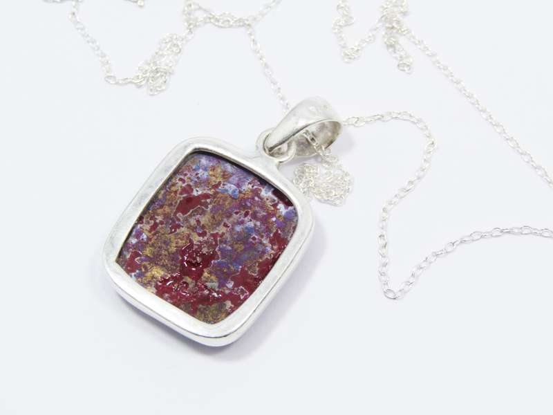 A Lovely Purple Copper Turquois Pendant on Chain in Sterling Silver