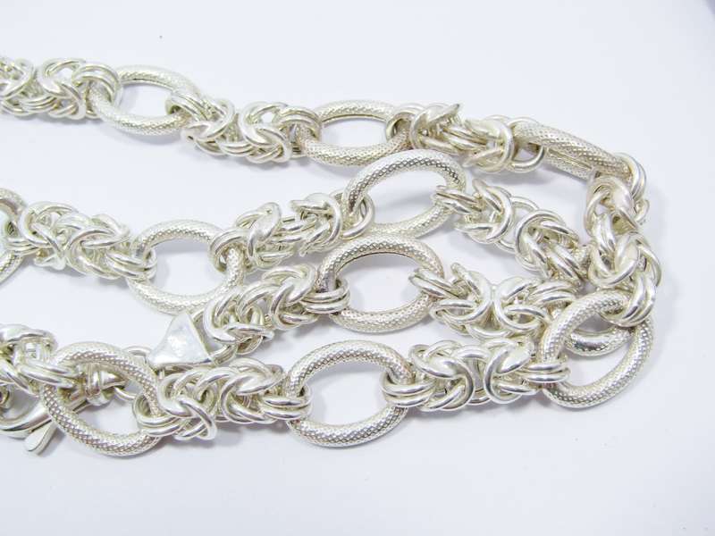 A Gorgeous Long  Fancy Link Necklace in Sterling Silver