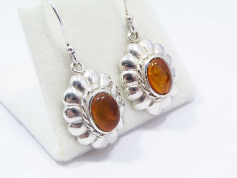 A Beautiful Pair of Vintage Design Amber Earrings in Sterling Silver.