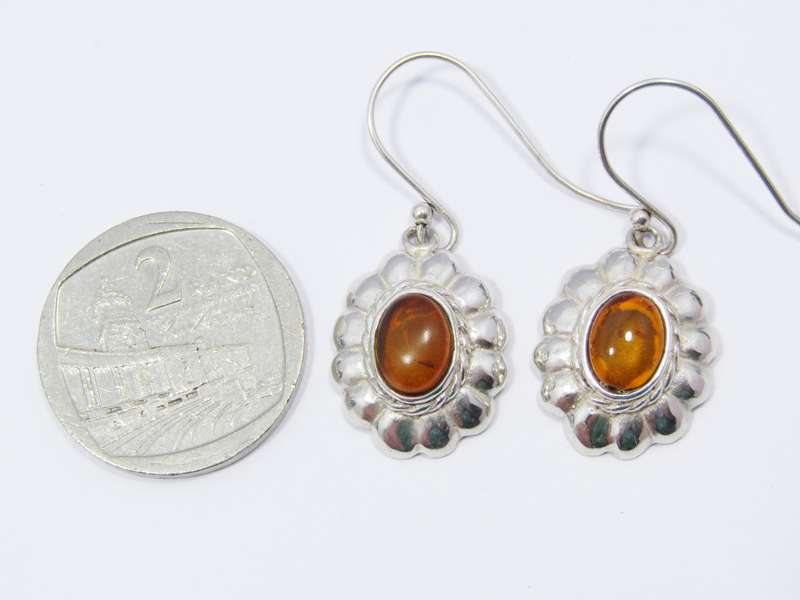 A Beautiful Pair of Vintage Design Amber Earrings in Sterling Silver.