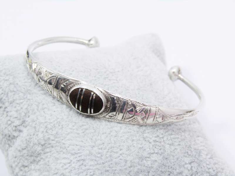 A Beautiful Tuareg Style Cuff Bangle With a Ebony Wood in The Center in Sterling Silver
