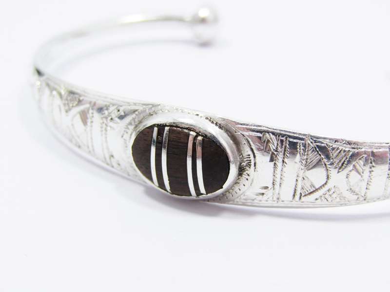 A Beautiful Tuareg Style Cuff Bangle With a Ebony Wood in The Center in Sterling Silver