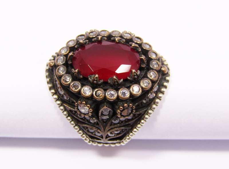 A Beautiful Two Tone Red Stone Dotted with Clear Crystals in Sterling Silver