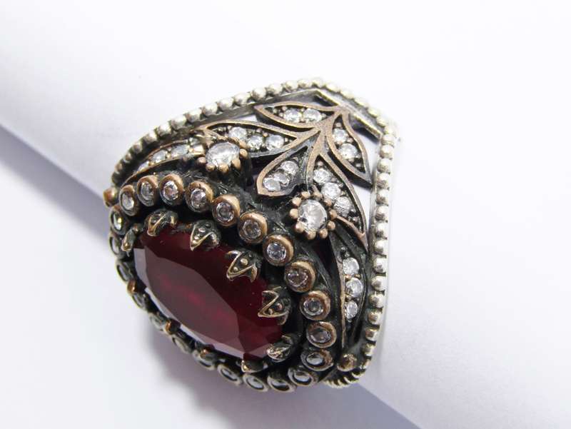 A Beautiful Two Tone Red Stone Dotted with Clear Crystals in Sterling Silver