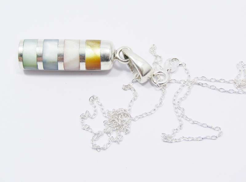 A Gorgeous Mother of Pearl Cylinder Design Pendant in Sterling Silver.