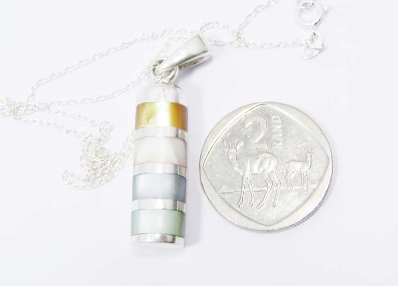 A Gorgeous Mother of Pearl Cylinder Design Pendant in Sterling Silver.