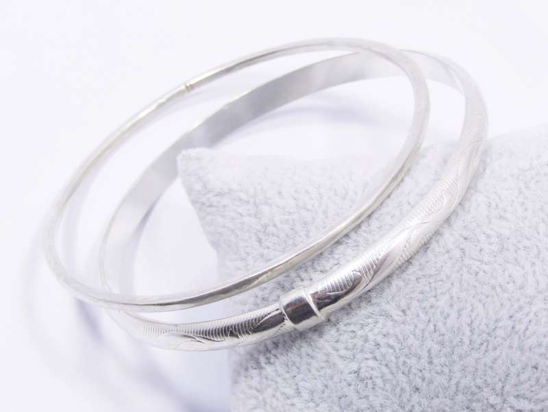 Two Lovely Stack Bangles in Sterling Silver.