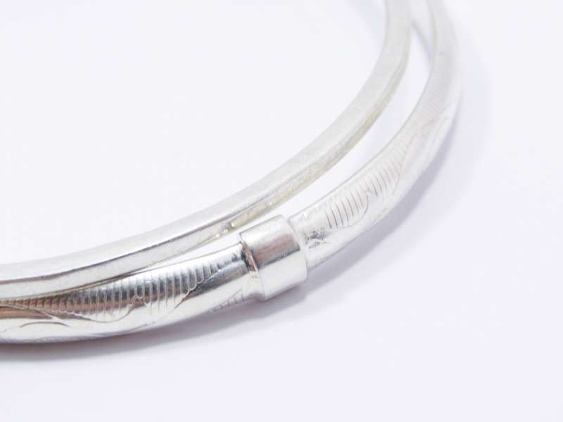 Two Lovely Stack Bangles in Sterling Silver.
