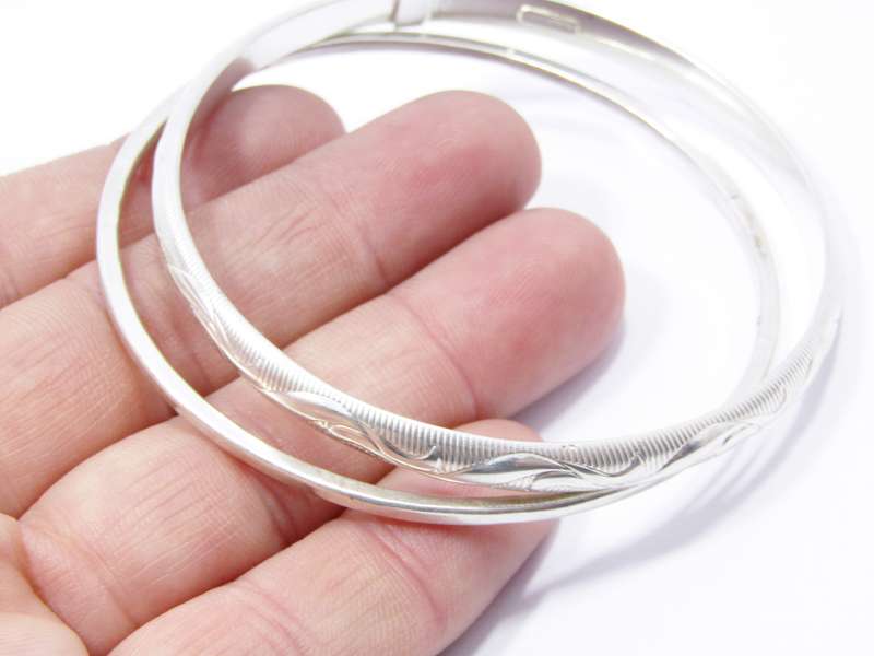 Two Lovely Stack Bangles in Sterling Silver.