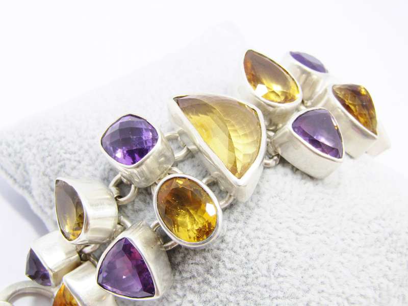 A Stunning Huge Gemstone Bracelet Bracelet Set with Amethysts and Citrines in Sterling Silver.