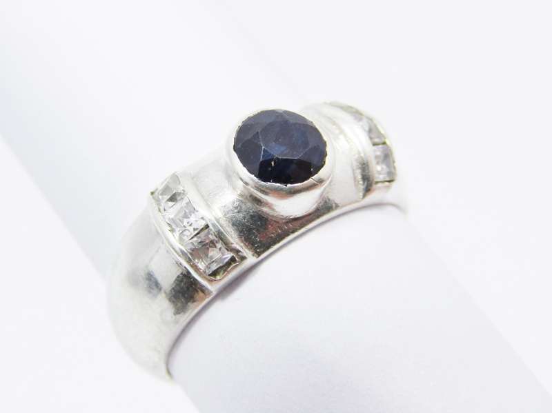 A Lovely Opaque Sapphire Ring in Sterling Silver.