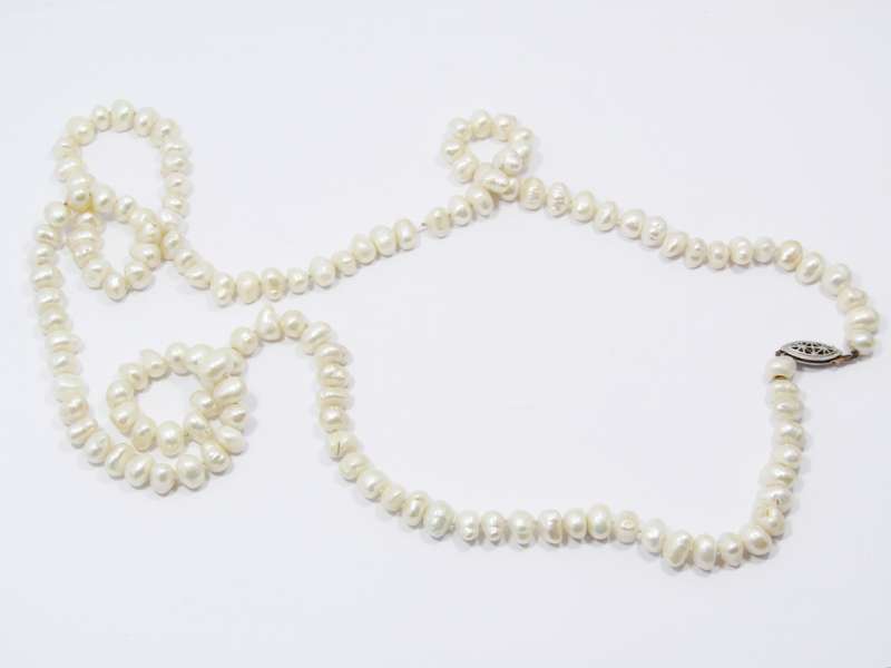 Lovely Long String of Freshwater Pearls with Silver Clasp